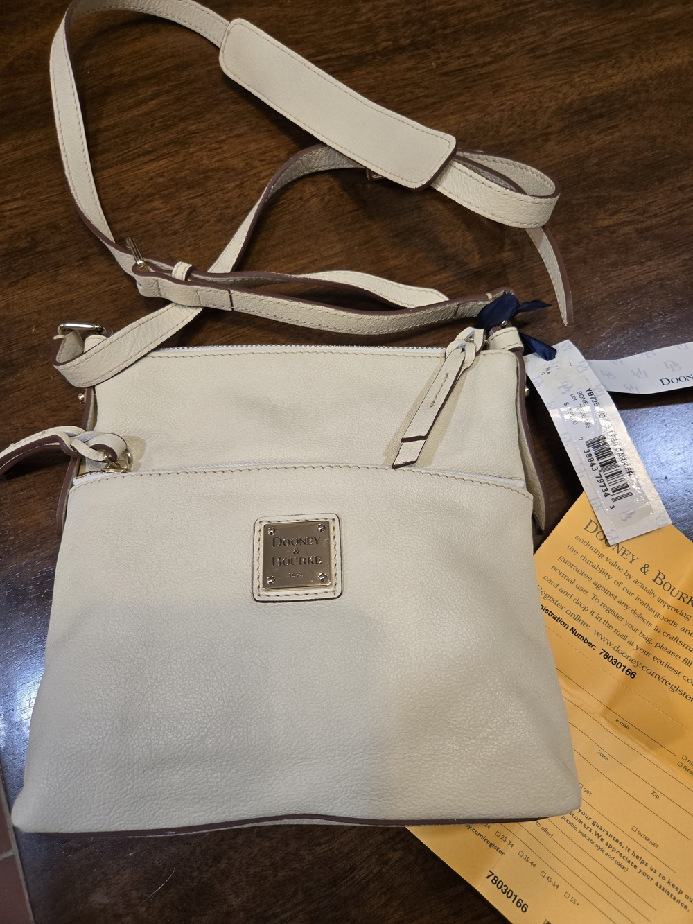 Dooney & Bourke Bone Pebbled Leather Crossbody Letter Carrier Bag-NWT
